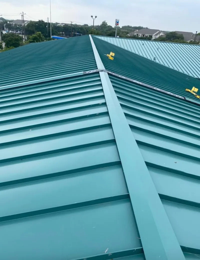 Green commercial metal roof ridge and valley for Metal Roof Repair in South Houston