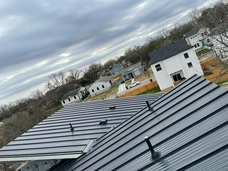 Standing seam metal roof panels with vents for Skylight Repair in South Houston